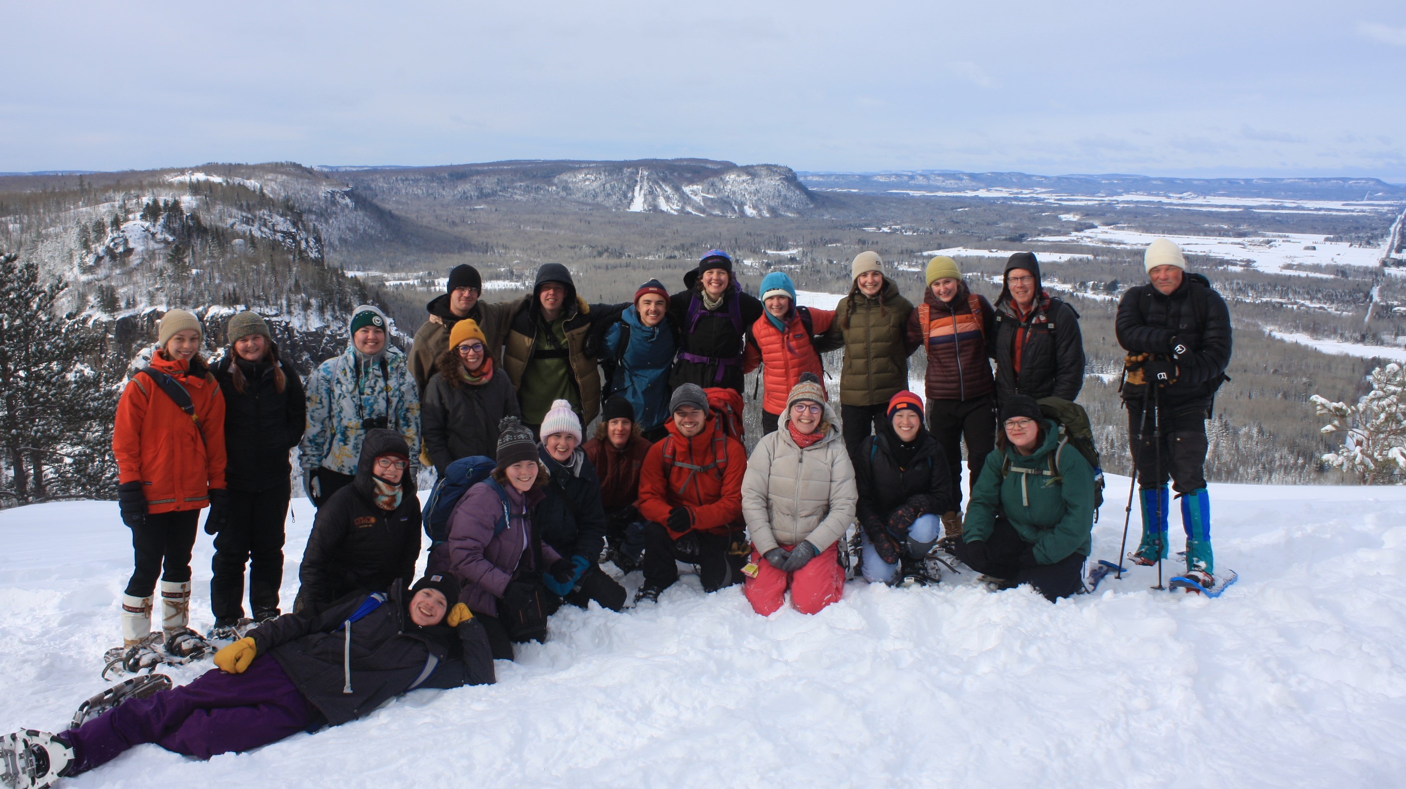 Environmental and outdoor education majors posing for a picture on top of a mountain