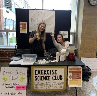 exercise science club tabling in Kirby with protein shakes