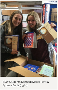 BSW Students Kennedi Mercil & Sydney Bartz holding up books they collected during a drive