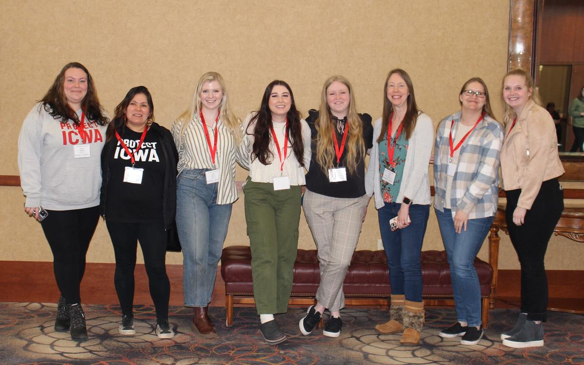 8 Child welfare scholars posing for a picture at the annual ICWA Conference.