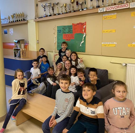Molly Hughes in the classroom with students in Slovenia