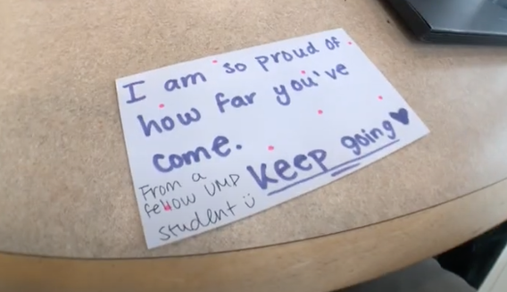 Note that says "I am proud of how far you have come. Keep going. From a fellow UMD student."