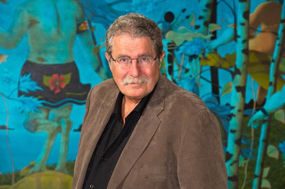 David Beaulieu portrait with colorful mural in the background